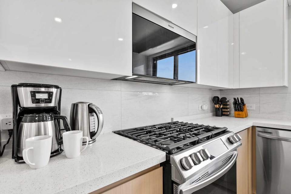 Start your day with fresh coffee or tea, with all essentials ready in the modern kitchen - Stainless steel appliances, gas stove & sleek countertops make meal prep effortless - Designed for convenience, whether you’re cooking a meal or a quick bite