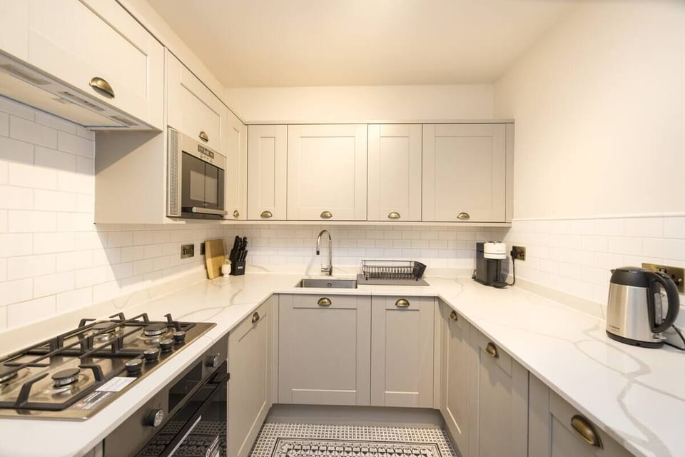 Family Apartment, City View | Private kitchen | Espresso maker, coffee/tea maker, electric kettle