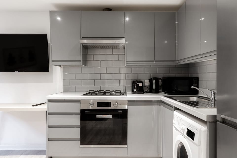 Economy Apartment, Private Bathroom (2) | Desk, laptop workspace, iron/ironing board