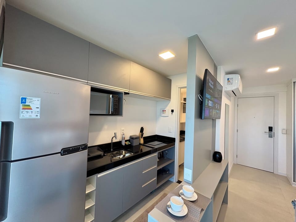 Deluxe Apartment, Lanai, Sea View | Private kitchen | Fridge, microwave, stovetop, cookware/dishes/utensils
