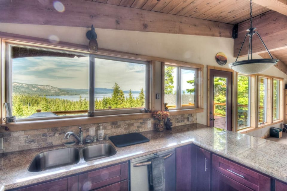 Lake view kitchen w/ blender, coffee maker, toaster, etc.
