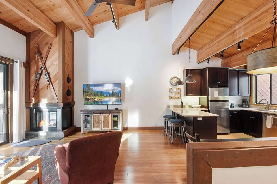 Open living space with Smart TV, and balcony