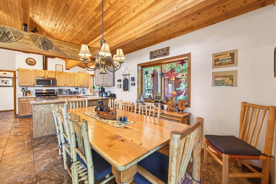 Dining room table next to kitchen