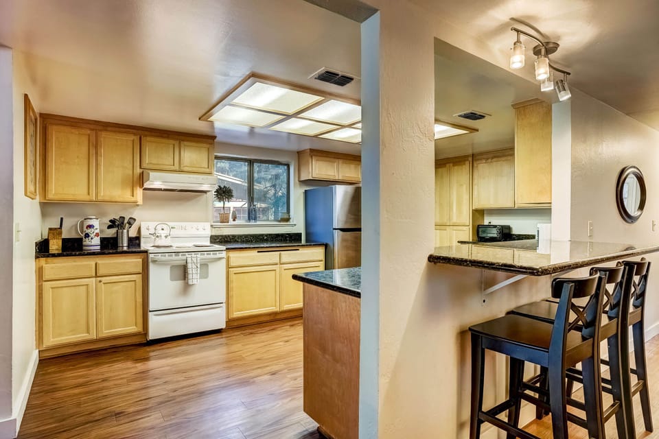 Full kitchen with drip coffee maker, toaster, kettle and more