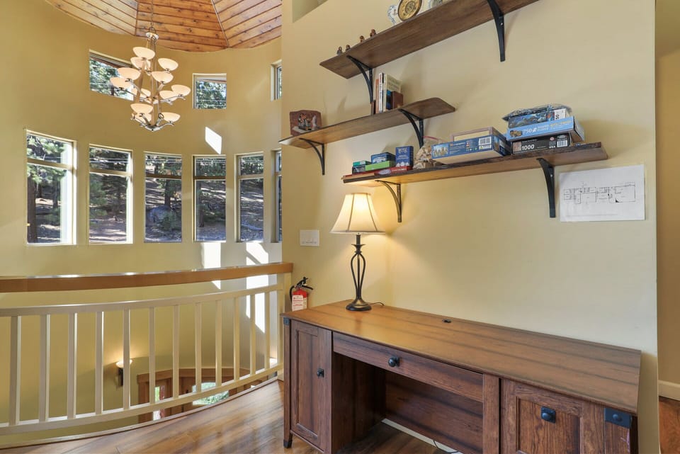 Upstairs reading and game area with desk space for working or studying