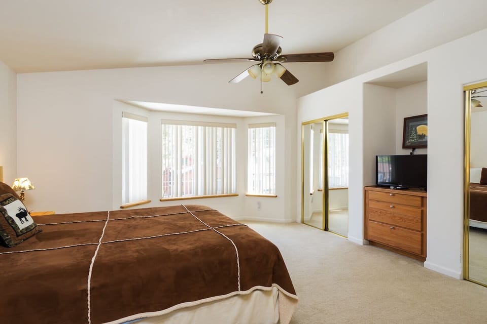 Master bedroom: King bed w/ TV