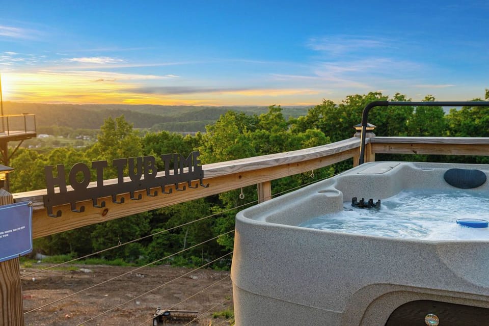 Soak in the hot tub while taking in sweeping Ozark views.