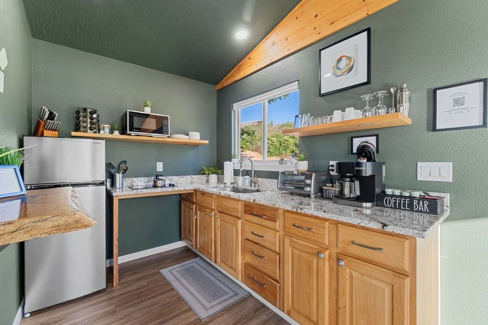 Enjoy a fully stocked kitchen and cozy coffee bar—your retreat, your way.