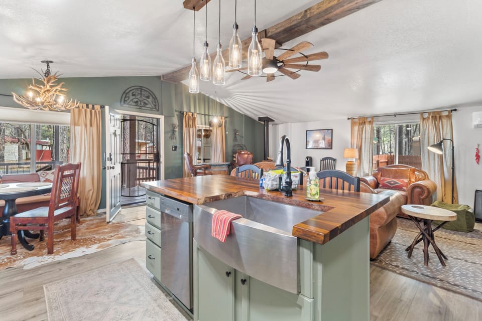 Enjoy cooking family meals and sharing breakfast at the butcher block island.