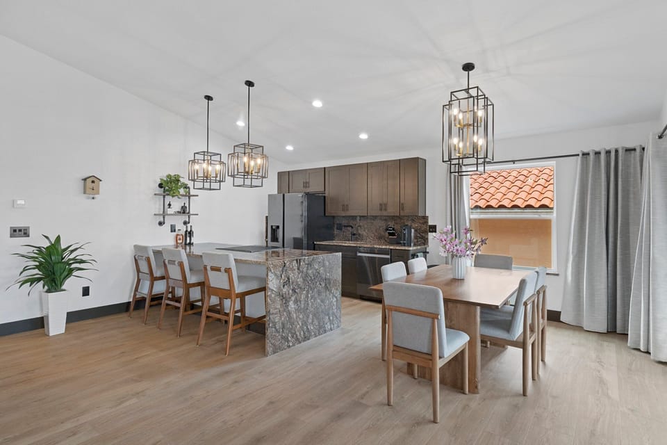 Fully equipped, luxurious kitchen with bar and dining area