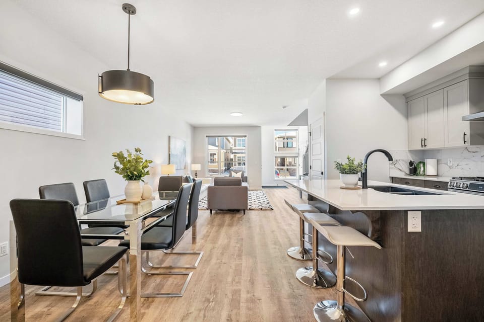From the island to the dining table to the living room - the whole main floor opens up and connects.