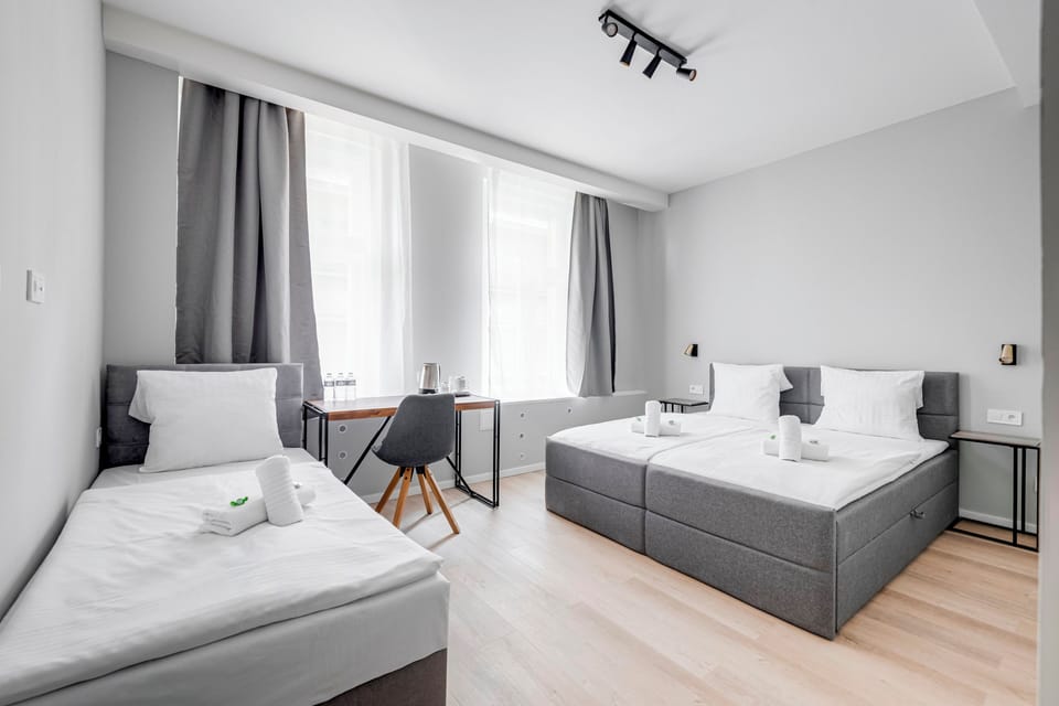 Superior Triple Room | Desk, iron/ironing board, free WiFi, bed sheets