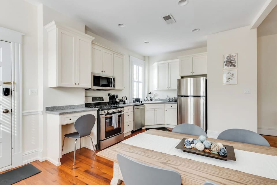 Kitchen: Bright and inviting with modern appliances and a stylish dining space for culinary adventures!