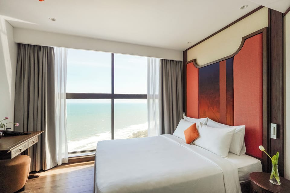 Deluxe Suite, Balcony, Sea View | Free minibar items, individually furnished, desk, laptop workspace