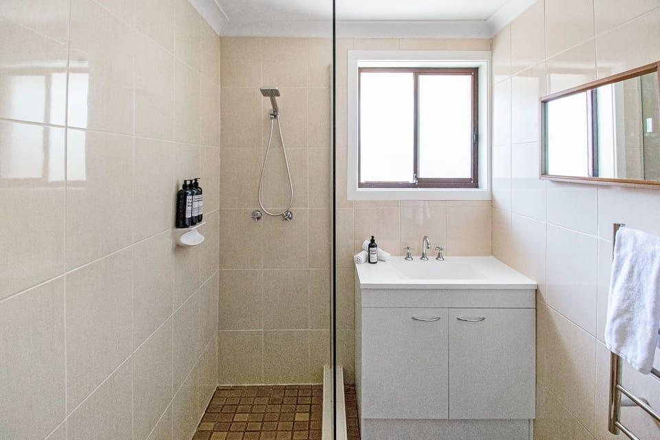 Bathroom 1 - Shower, Toilet + Hair Dryer
