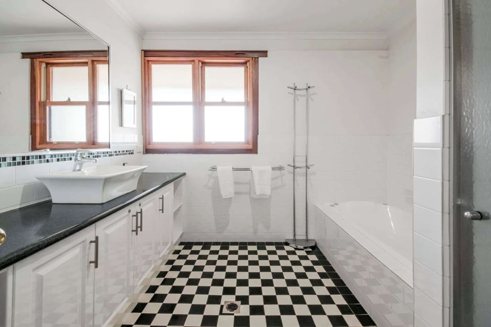 Bathroom - Shower, Bath, Toilet + Hair Dryer