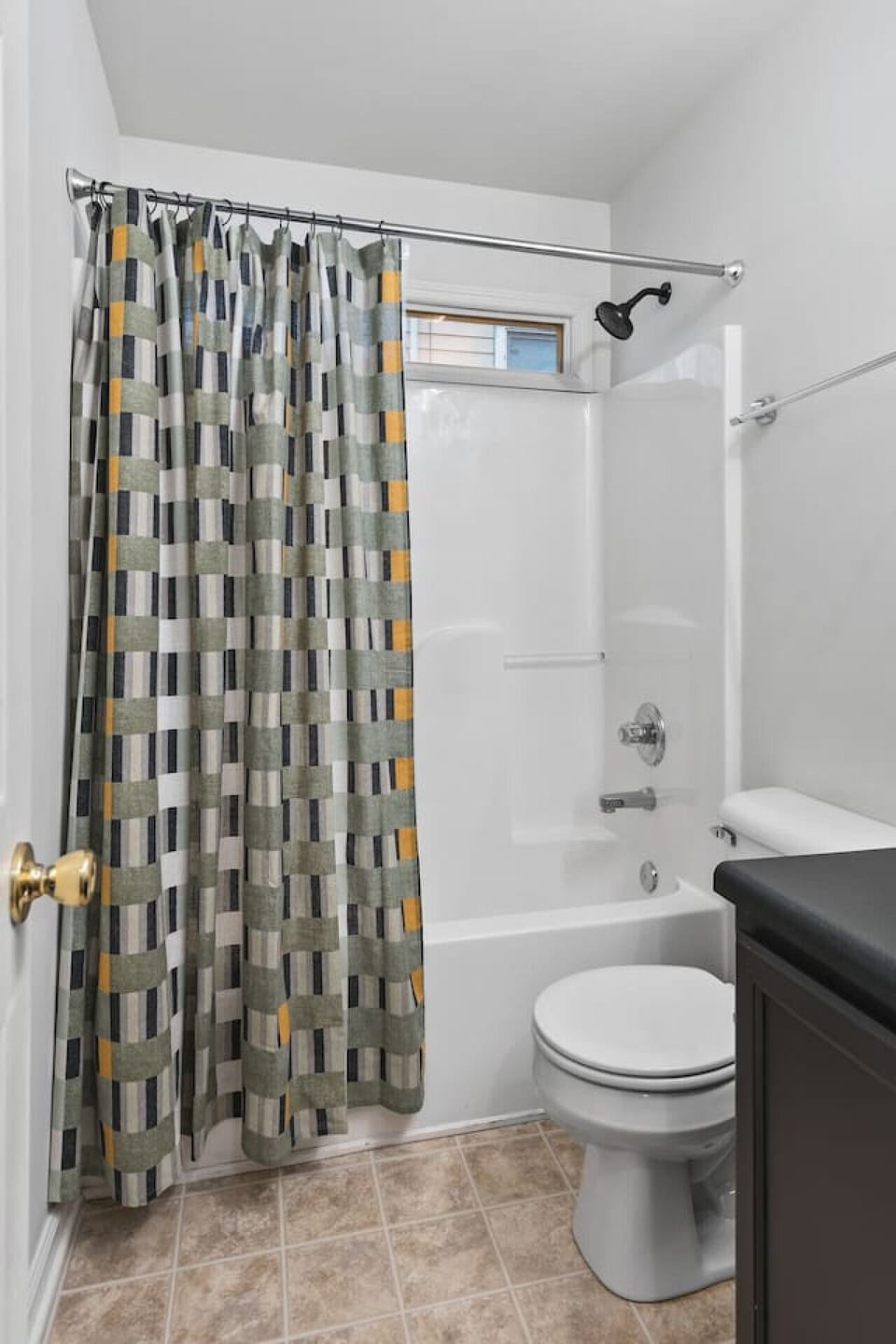 Bathroom #1 - Large full size bathroom with shower/tub combo + bathroom essentials located down the hall from bedrooms 1 and 2.