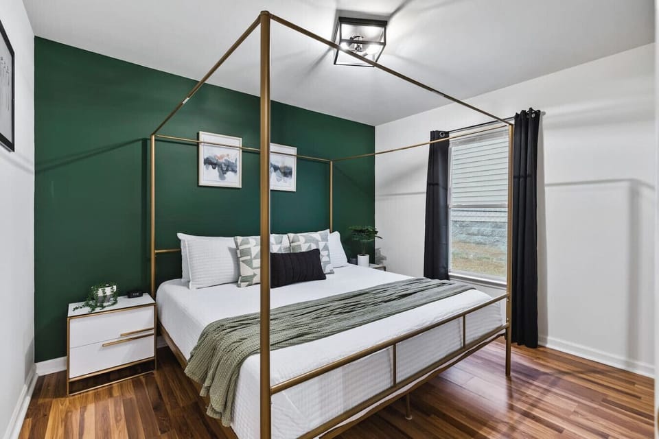 Bedroom 1 has One King Bed. Room darkening curtains, Closet with hangers and shelf, Nightstands to store your belongings in.