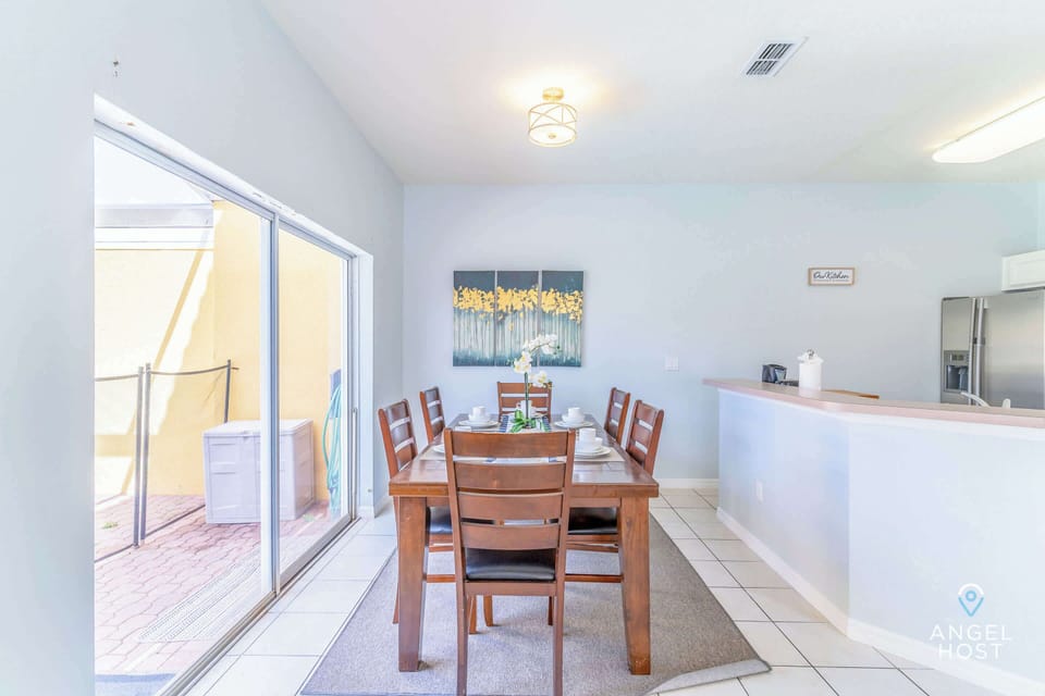 Enjoy a relaxing sit-down meal with a view of the pool.