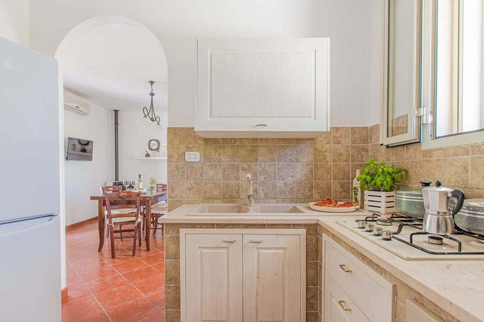 Countertop, Kitchen Appliance, Kitchen, Interior Design, Cabinetry, Flooring, Furniture, Major Appliance, Floor, Ceiling