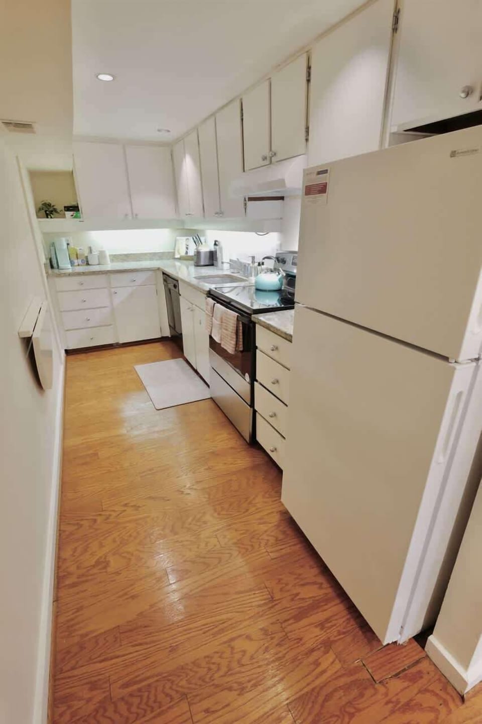 Full sized kitchen comes equipped with all your cooking and coffee needs! 