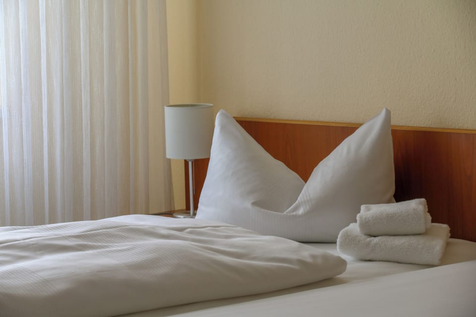 Hypo-allergenic bedding, desk, laptop workspace, free WiFi