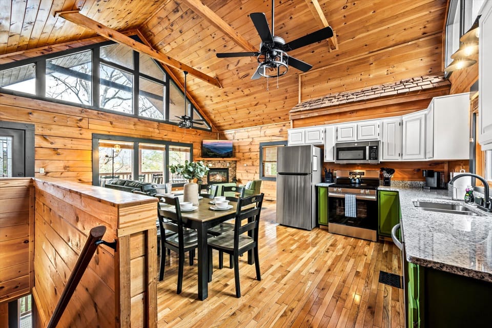 Cook, dine, and relax in a beautifully designed space with high ceilings and natural light.