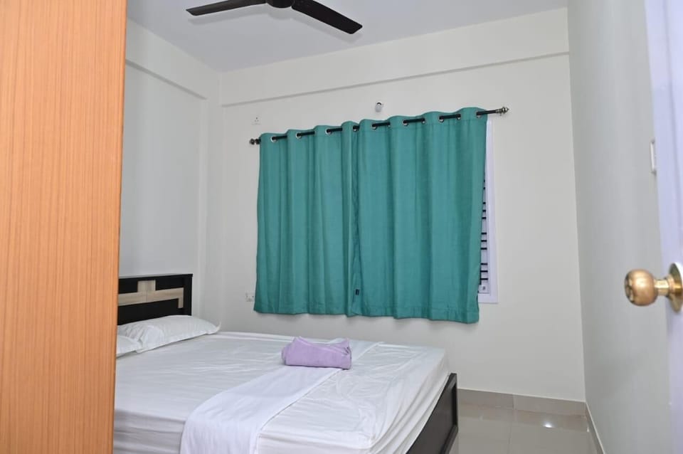 Comfort Apartment, 2 Bedrooms, Balcony, City View | In-room safe, desk, laptop workspace, blackout drapes