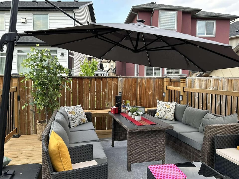 Enjoy the beautiful summer weather on the patio furniture as you watch the kids play in the yard!