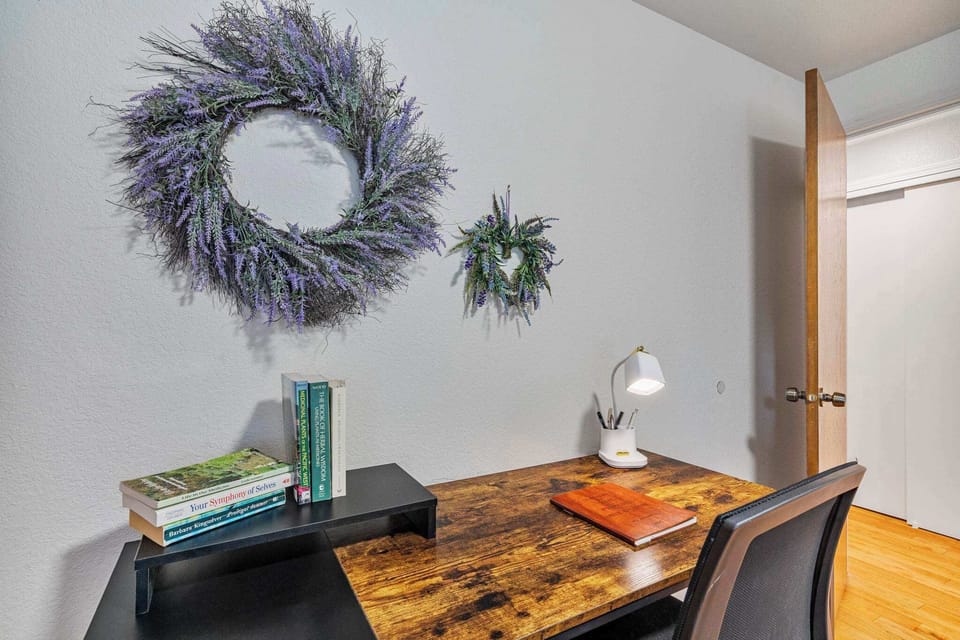 Catch up on work at the workstation in the garden room. This space offers a desk, chair, printer, and paper shredder. Perfect for catching up on work. 