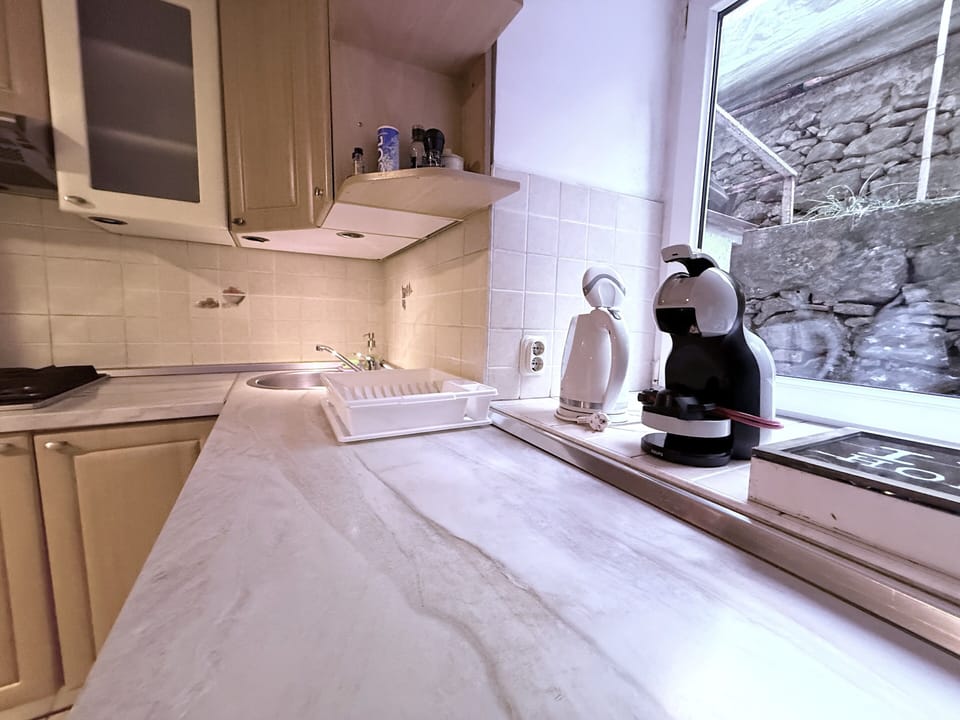 Apartment, Patio, Garden View | Private kitchen | Full-size fridge, oven, stovetop, dishwasher