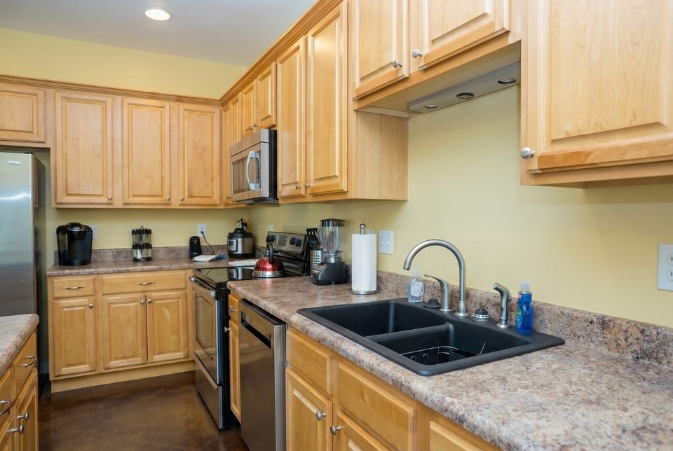 Bright kitchen with stainless appliances and plenty of counter space