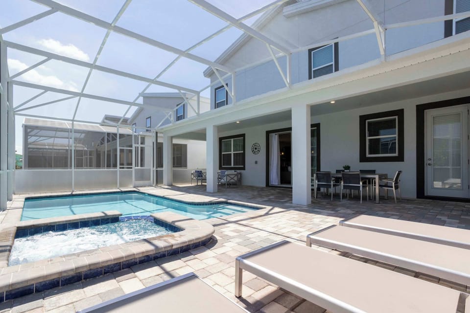 Private pool and spa + outdoor dining and seating area.
