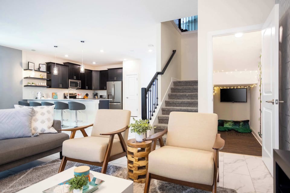 Open floor plan connects the kitchen, living & dining rooms, offering plenty of space for the whole group to be together!