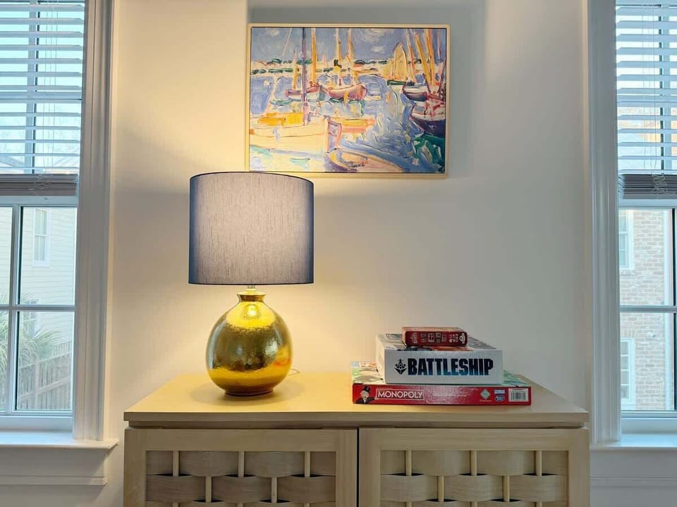Hand picked details and soft lighting really tie together the whole space. Grab a book and curl up on the coy, colorful couch. 