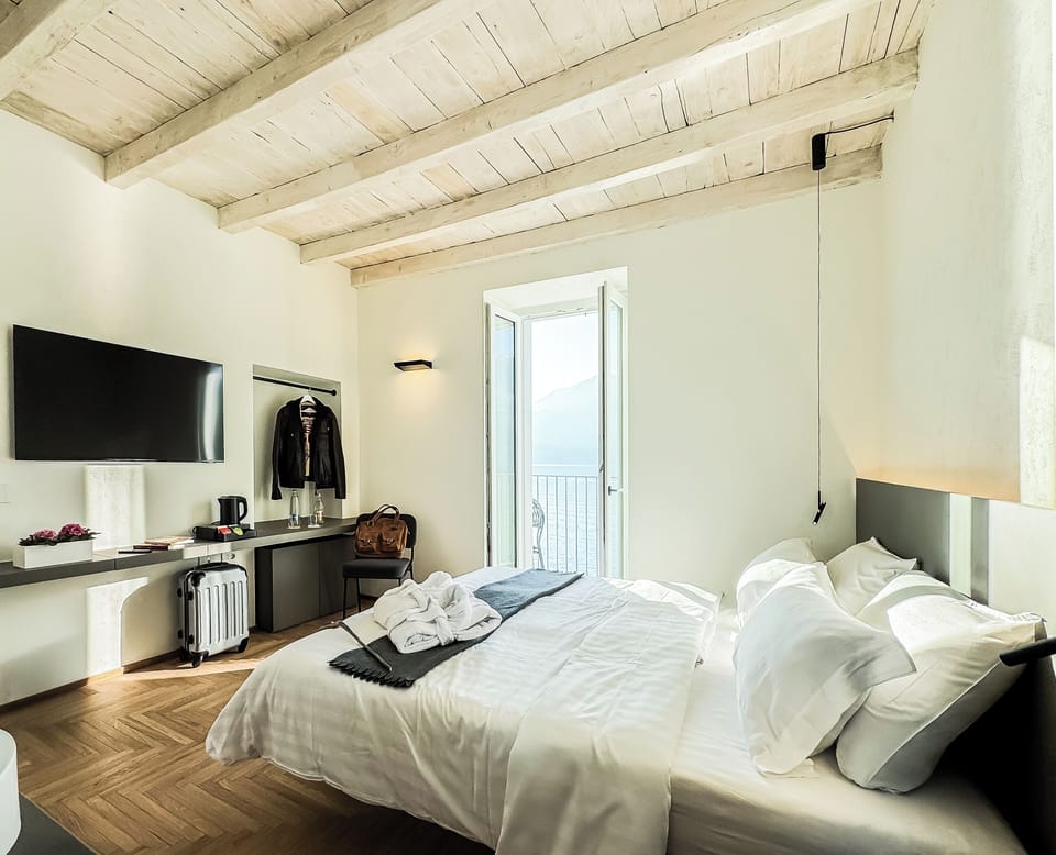 Deluxe Room, Balcony, Lake View | Premium bedding, down comforters, memory foam beds, minibar