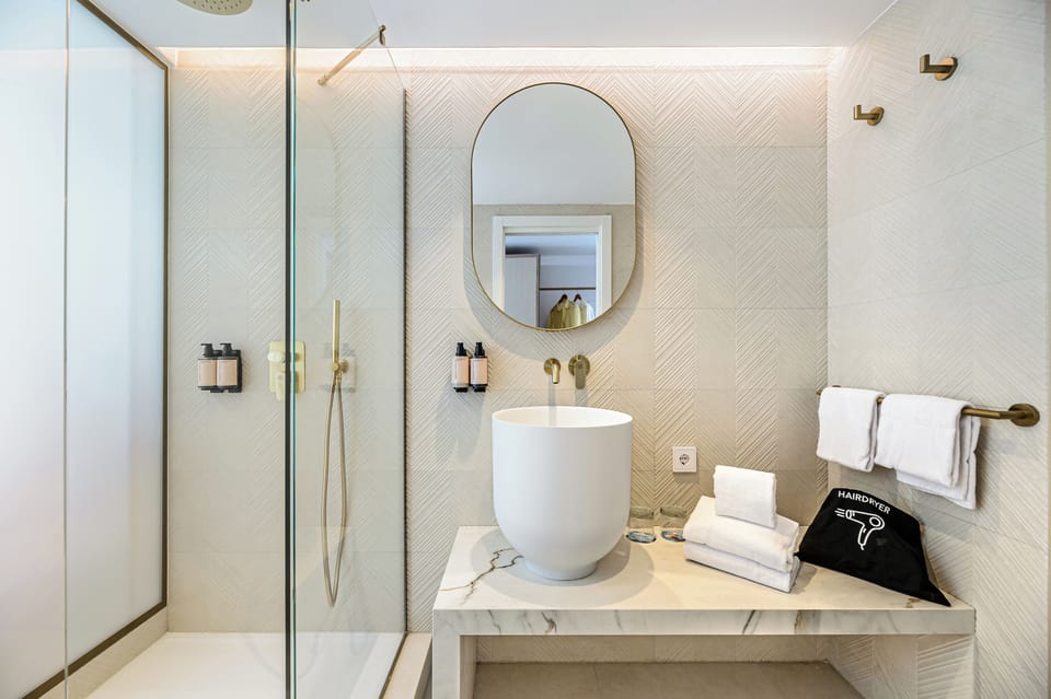 Twin Room, Pool View | Bathroom | Shower, hair dryer, towels, soap