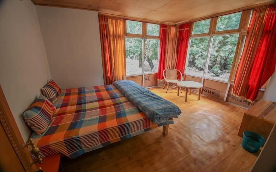 Basic Double Room, Mountain View | Desk, laptop workspace, WiFi (free), bed sheets