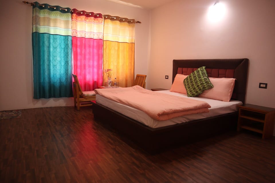 Deluxe Double Room, Garden View | Desk, laptop workspace, WiFi (free), bed sheets
