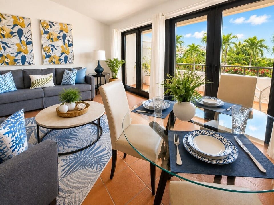 Bright and inviting living area with comfortable seating and a relaxed coastal atmosphere
