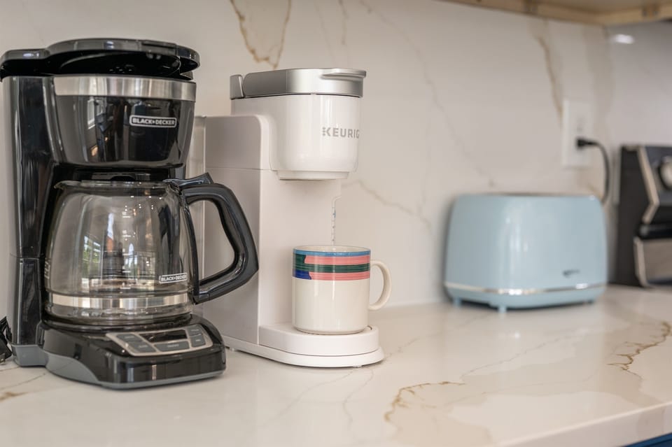 Coffee station ready to fuel your mornings—featuring Drip coffee maker, Keurig & toaster