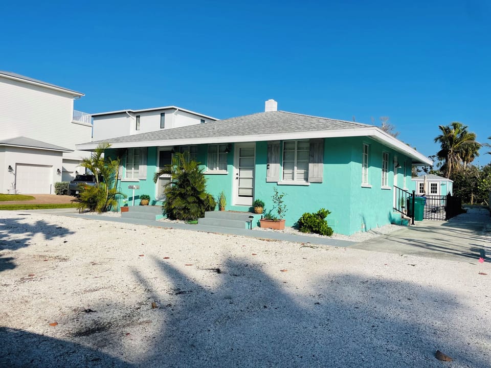 Double driveways and alley access for over flow parking and boat trailers.