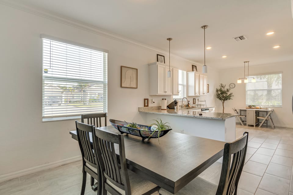 Dining & Kitchen Area | Open & Bright Interior | Central A/C & Heating