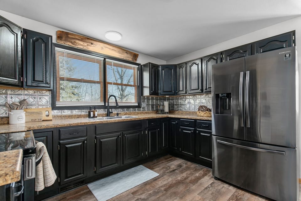 The spacious kitchen is perfect for gathering, cooking, and making memories together.