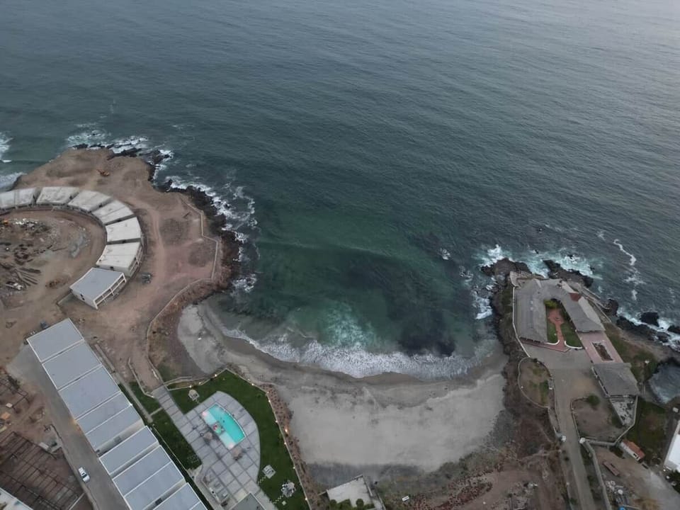 Aerial view of the complex. Semi private beach