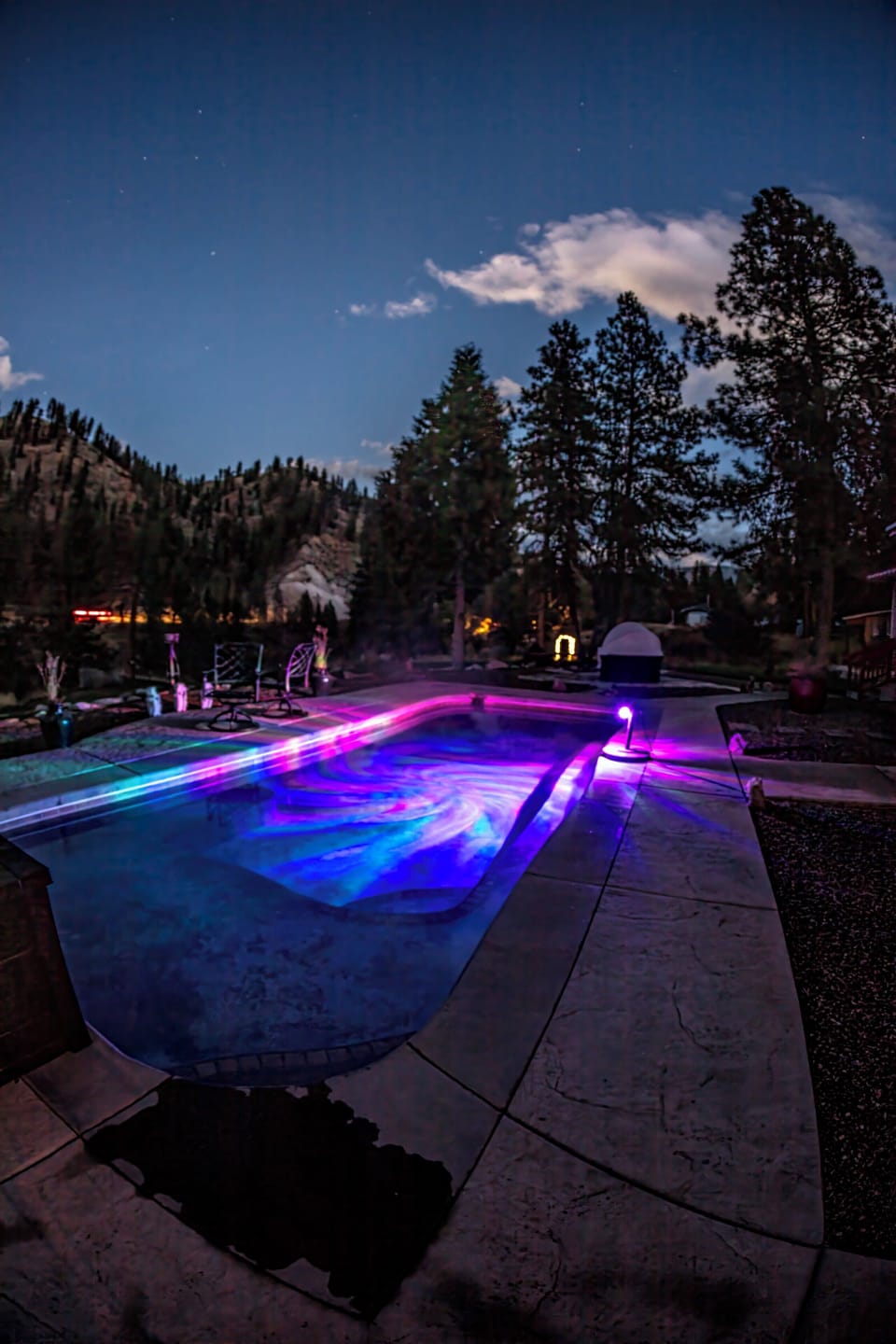 Night shot of the pool looking northeast.