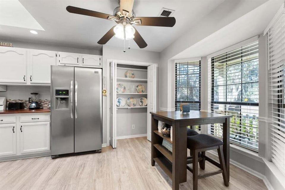 The pub table for two in the kitchen is perfect for morning coffee, a quick snack, or chatting with the chef while meals are prepared.