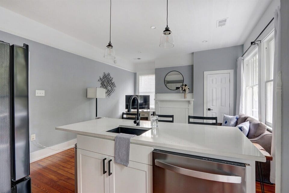 Bright and functional, the kitchen offers modern amenities and plenty of charm.