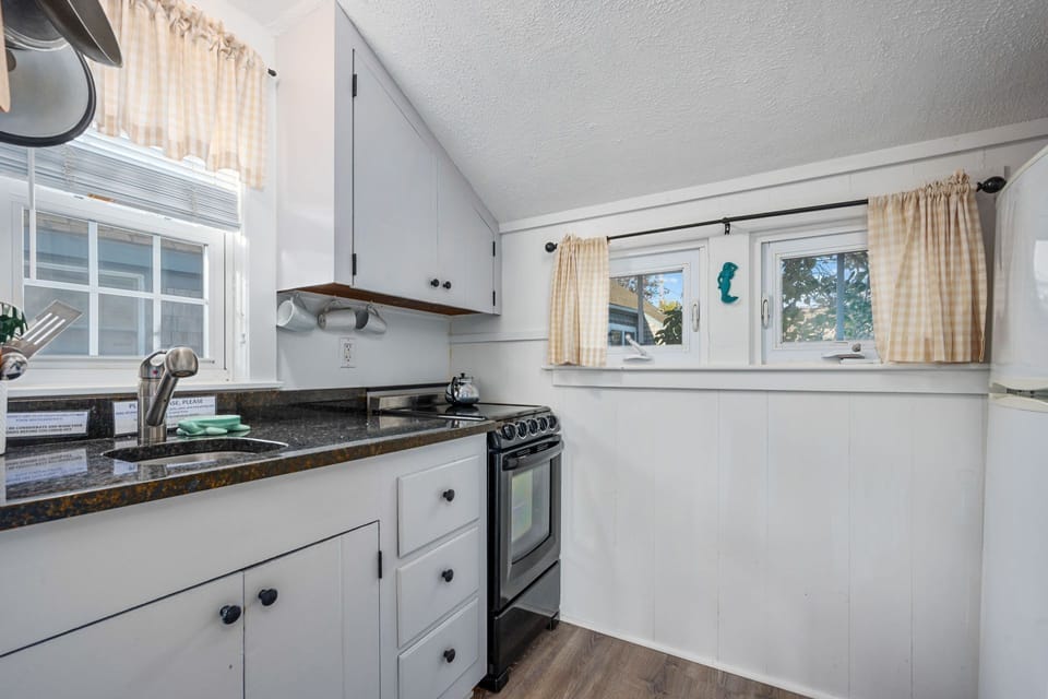 Kitchen with fridge and stove