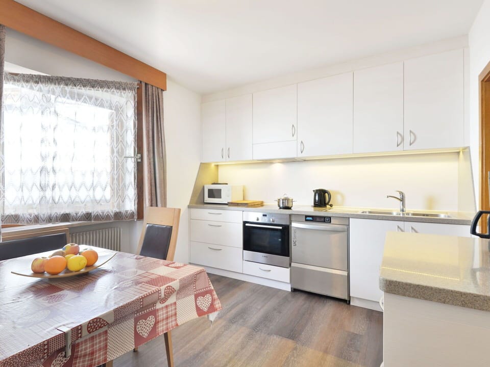 Interior Design, Furniture, Flooring, Kitchen, Wood, Floor, Ceiling, Countertop, Room, Cabinetry